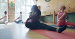 Stretching, yoga and wellness with black woman in class for fitness, meditation and mindfulness. Peace, health and learning with people in pilates studio for balance, workout and energy exercise