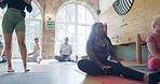 Yoga class, exercise and stretching, people workout together and health, coach and wellness at gym. Pilates, healing and active group with training in sportswear, healthy body and physical activity