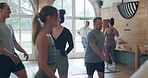 Fitness, yoga and instructor with people in class for learning, health and mindfulness. Spiritual, motivation and workout with woman in pilates studio for peace, meditation and holistic wellness