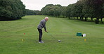 Man, golf course and stroke with club, swinging and golfing for ball, fitness and exercise. Countryside, grass and game for training, outdoor and recreation for hobby, playing and sport technique
