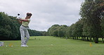 Woman, golf stroke and training on course, sports and outdoor practice for performance in competition. Female person, athlete and motivation for workout, exercise and commitment on grass or swing