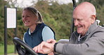 Woman, man or happy in golf cart on field, health wellness or fitness leisure for funny joke on weekend. Elderly man, young lady and talking with sport fun, comedy and waiting time for game to start
