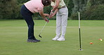 Sport, coach and woman training on golf course for development in stroke and swing of club. Hands, closeup and mentor holding stick for player, athlete and student learning on pitch in sports game