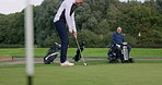 Sports, golf and mature woman on course for playing game, training and swing for recreation. Retirement, golfer and elderly person with disability and golfing club and ball for fun, hobby and stroke
