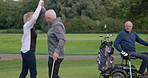 Golfers, golf course and high five with friends, sports and victory for win, athlete and practice. Club, grass and lawn for training, outdoor and recreation for hobby, golfing and game equipment
