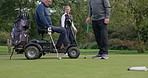 Wheelchair, golf and senior man with friends to play game, training or sports course for recreation. Retirement, golfer and elderly person with disability and golfing club for fun, hobby and swing