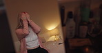 Night, stress and the reflection of a woman in the bedroom of her home with depression or insomnia. Mirror, anxiety and hands on the face of a tired, exhausted or sleepless person sitting on the bed