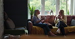 Coffee break cup, home friends and women conversation, talking and speaking about social wellness, reunion or news. Apartment lounge, sofa and relax people share gossip, advice and drink caffeine mug