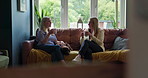 Coffee break mug, home friends and women conversation, communication and chat about social wellness, reunion or news. Lounge, sofa or relax people listen to gossip, advice and drink espresso caffeine