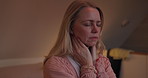Night, stress or anxiety and a woman in the bedroom of her home feeling exhausted with insomnia. Face, hands and mental health with a tired or sleepless person sitting on a bed in an apartment
