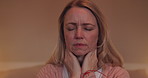 Face, night or stress and a woman in the bedroom of her home feeling exhausted with insomnia. Mental health, depression or frustration and a tired or sleepless person sitting on a bed in an apartment