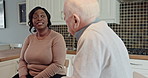 Kitchen, care and couple in support with talking, happy and interracial love in retirement with respect. Elderly man, young woman and talk for bonding in morning, relax together or trust in apartment