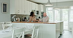 Talking, kitchen and caregiver with senior man for conversation, communication and chat. Retirement home, assisted living and black woman with elderly patient for bonding, support and medical service