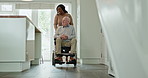 Elderly, man or caregiver with conversation or wheelchair for support, pointing and happy in kitchen. Senior, person or woman with communication, talking and handicap in retirement home for volunteer