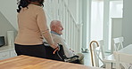 Senior, man or caregiver with conversation or wheelchair for support, pointing and happy in lounge. Elderly, person or woman with communication, talking and rear view in retirement home for volunteer
