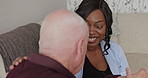 Empathy, old man and caregiver on sofa talking with homecare, kindness and helping hand in nursing home. Senior care, comfort and advice, elderly person on couch with woman, nurse and support in chat