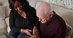 Help, laptop and caregiver with elderly man on sofa for research, online medical email and website. Retirement home, connection and carer with senior patient on computer for service, care and support