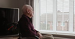 Senior man, wheelchair and looking out window in wonder, thinking or dreaming at old age home. Elderly male or person with a disability contemplating life, decision or choices in retirement house