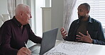 Man, real estate agent and computer for home meeting, planning and talking of rent, mortgage or payment plan. Senior seller, realtor or agent with clients or people on laptop for house and investment