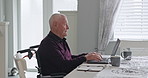 Home, wheelchair and old man with a laptop, typing and online reading with email for life insurance, network and retirement. Person with disability, house and senior guy with computer and pensioner