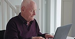 Home, wheelchair or old man with a laptop, internet or online reading with email for life insurance, typing or retirement. Person with disability, house or senior guy with computer, tech it pensioner