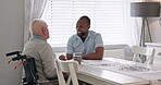 Home, nurse and old man in a wheelchair talking with support, care or advice for healthcare in retirement. Elderly, caregiver and person with a disability with help, kindness or chat in coffee break