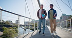 Talking, students and walking in university campus for education, studying and conversation outdoor. Bridge, friends and bonding with discussion at college, support and share knowledge for literature