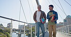 Men, students and walking in university campus for education, studying and conversation outdoor. Bridge, friends and bonding with discussion at college, support and share knowledge for literature