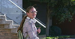 Face, books or happy girl walking to college campus outdoor for learning opportunity or education. Portrait, smile or student at university school with glasses for knowledge, study or travel to class