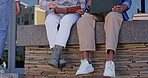 Legs, students or people on campus in university steps or college stairs for research books or help. Shoes, laptop or friends sitting on ledge for class project, learning or school exam preparation