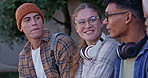 Group, talking and smile for exam, college and friends with headphones, questions and practice in campus. Education, people and knowledge for test, happy and university students, studying or laughing