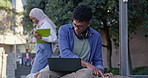 Learning, student and man with books, laptop and research for assignment, scholarship and internet. Person, campus and guy with computer, language project and university with website info and college