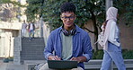 Black man, laptop and face for outdoor education on campus, online assignment and research for project. Male person, student and registration on website, portrait and knowledge for exam in Kenya