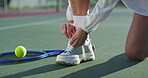 Tennis, sport and hands tie shoes to start exercise, match or mature player at competition. Legs, outdoor or person tying laces on sneakers to prepare for training or ready for game on turf closeup