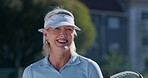 Mature woman, tennis and smile for fitness, exercise and training for health, athlete and outdoor. Sports, workout and player with confidence for match, happy and ready for game in park and hobby