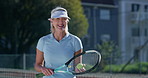 Tennis, training and senior woman on court, game and racket for activity, competition and smile. Outdoor, mature person and healthy player with ball, fitness and workout with sports and recreation