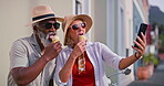 Mature couple, selfie and outside with ice cream for bonding or fun, break and summer holiday. People, interracial relationship and happy on vacation for social media post, profile picture and relax