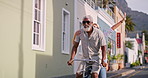 Freedom, senior couple and travel by bicycle for riding, adventure and exploring on vacation together. City street, woman and man with bike for cycling, connection and bonding with pedal in marriage