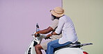 Couple, scooter and riding for travel, holiday and fun adventure or tourism in city road with wind. Man, motorbike and woman for summer trip, vacation and journey with direction pointing in Cuba
