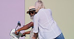 Mount, senior couple and travel with motorcycle for riding, adventure and explore on vacation together. City, woman and man with scooter for transport, connection and bonding with love in marriage