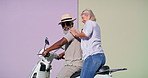 Mount, senior couple and travel with motorbike for riding, adventure and explore on vacation together. City, woman and man with scooter for transport, connection and bonding with love in marriage
