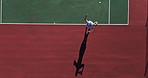 Tennis court, person and exercise with serving for game, match or tournament in competition, play and activity. Training, outdoor sport and athlete with above for fitness, workout or challenge in UK