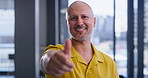 Creative, happy man or feedback with thumbs up for positive review or vote at modern office. Portrait, male person or employee designer with smile, like emoji or yes sign for good job or well done