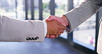 Business people, men and handshake in office with greeting for introduction, welcome or b2b meeting. Company merger, employees or shaking hands in building for partnership deal, agreement or contract