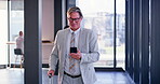 Business, mature and man with phone at airport for travel schedule, booking flight and online information. Corporate, male person and mobile with luggage for digital ticket, transport and opportunity
