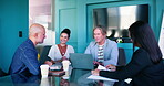 Reading, laptop and group in boardroom, talking and proud of pitch, meeting and discussion with boss. Collaboration, creative and business people with ideas, publicist and celebration in media agency