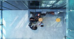 Collaboration, luggage and meeting with business people in airport from above for corporate planning. Brainstorming, strategy and suitcase with employee people in lobby together for travel from above