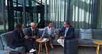 Meeting, team and business people in airport lounge for discussion on b2b partnership, deal or merger. Conversation, company travel and financial advisors with client stakeholders for investment.
