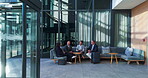 Business people, planning and diversity in lobby for collaboration, project and discussion with suitcase. Corporate, travel and waiting room conversation for networking, clients and industry contact
