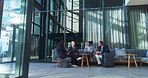 Business meeting, lobby and corporate lawyer staff with planning and attorney people in office. Group, management and men with communication at law firm in waiting room with legal case preparation